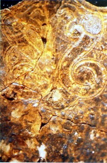 détail dragon sur un fourreau trouvé lors de fouilles de Bucy.